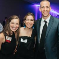 Three guests posing at Enrichment.